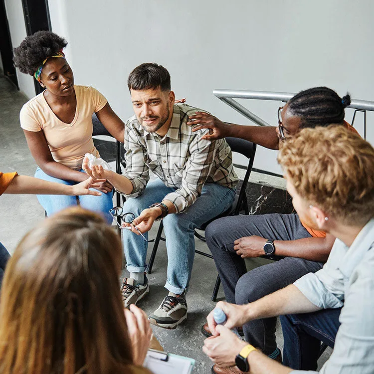 OMD addiction patient in support group meeting web