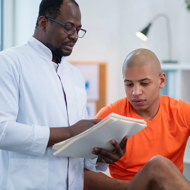 OMD doctor describing treatment plans with patient web