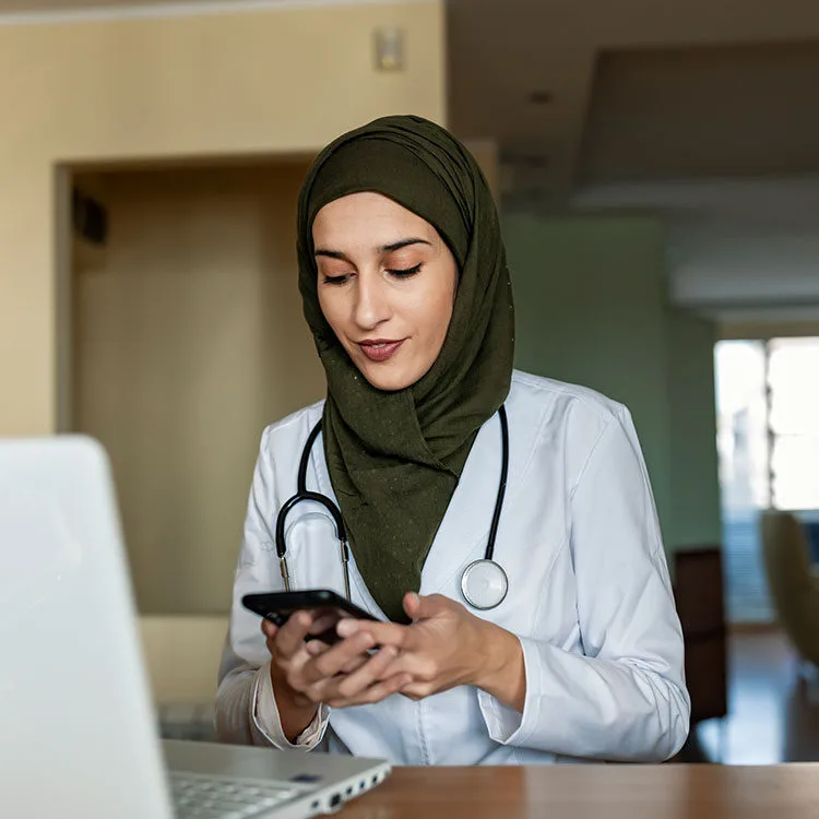 OMD doctor reviewing treatment progress web