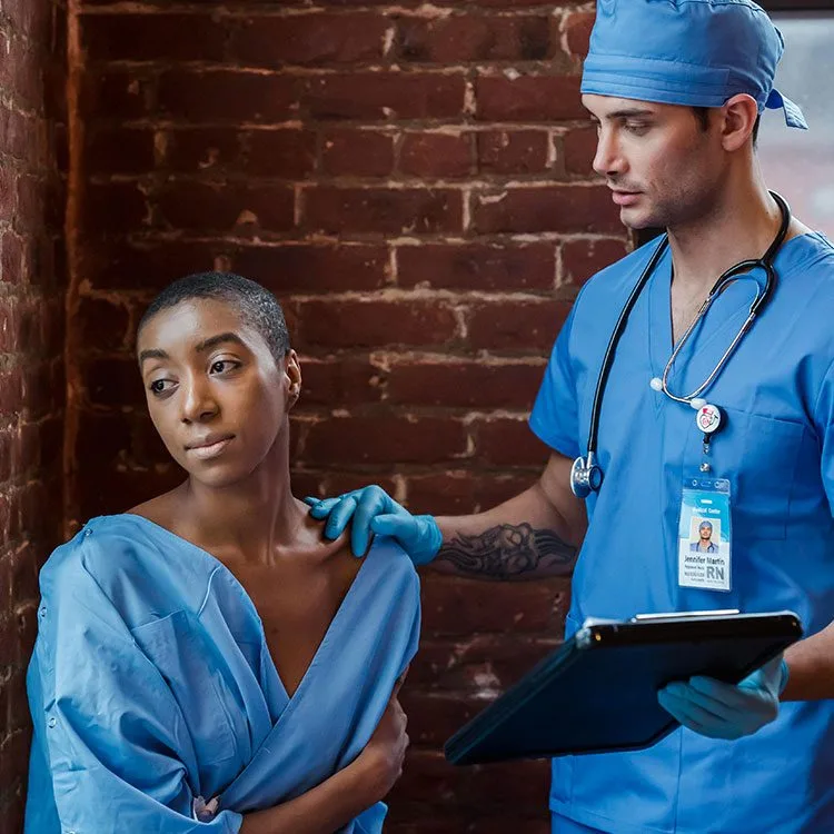 Doctor consoles concerned patient web
