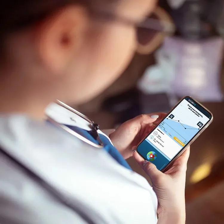 Doctor holding a mobile phonev2 web