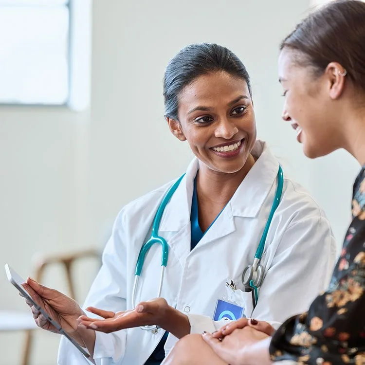 Doctor showing positive test results to patient web