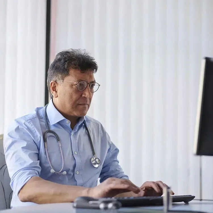 Doctor working on computer web