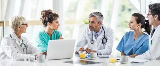 Doctors reviewing prom data crop