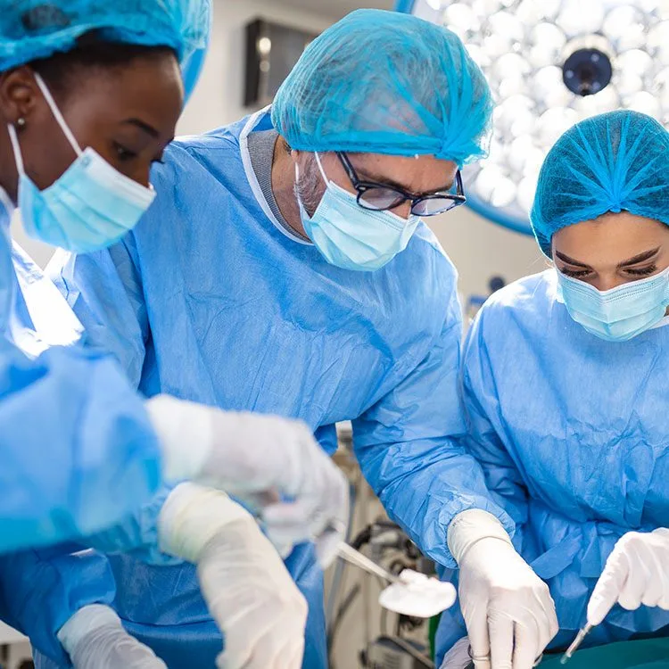 Surgical team performs cardiac surgery on patient web
