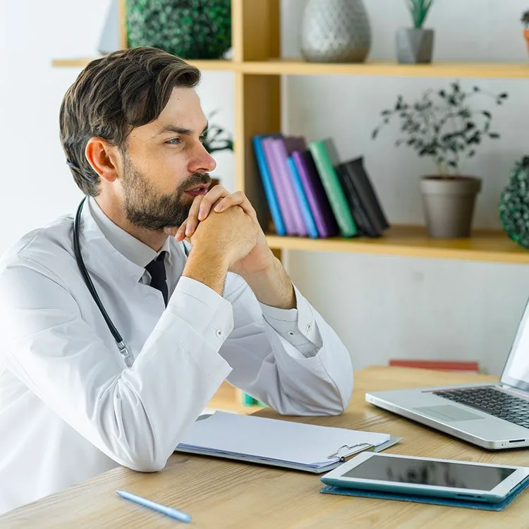 Thoughtful young doctor office web